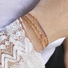 Afbeelding in Gallery-weergave laden, gouden armbandjes met edelstenen in roze en paars