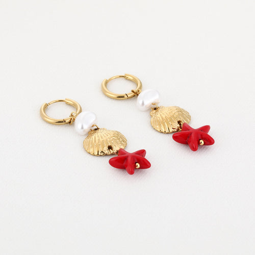 gouden oorbellen met rode zeester